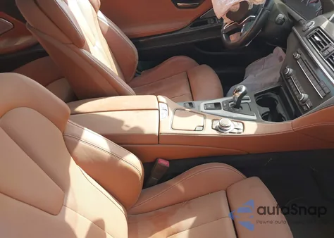 2014 BMW M6 Base (M7) z USA, uszkodzony, nr VIN WBSLZ9C52ED651041